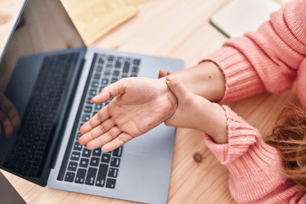 young-beautiful-hispanic-woman-ecommerce-business-worker-suffering-wrist-pain-office (1).jpg